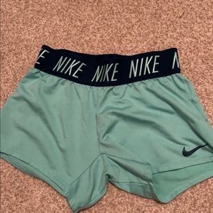 Girls Nike small shorts. Teal in color. Super cute